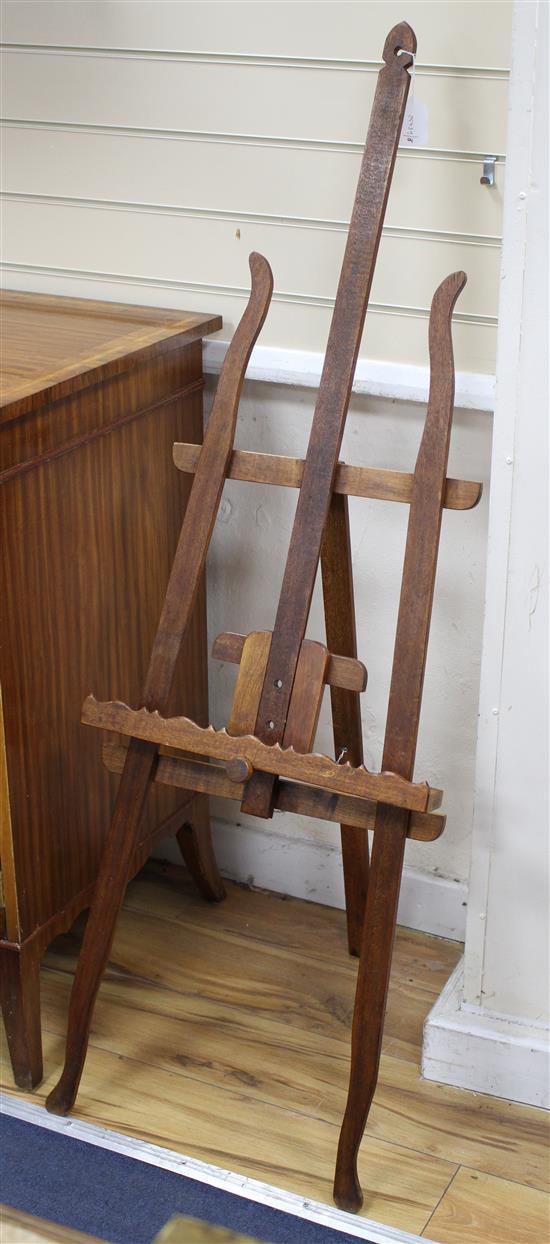 An Arts & Crafts beech easel H.140cm